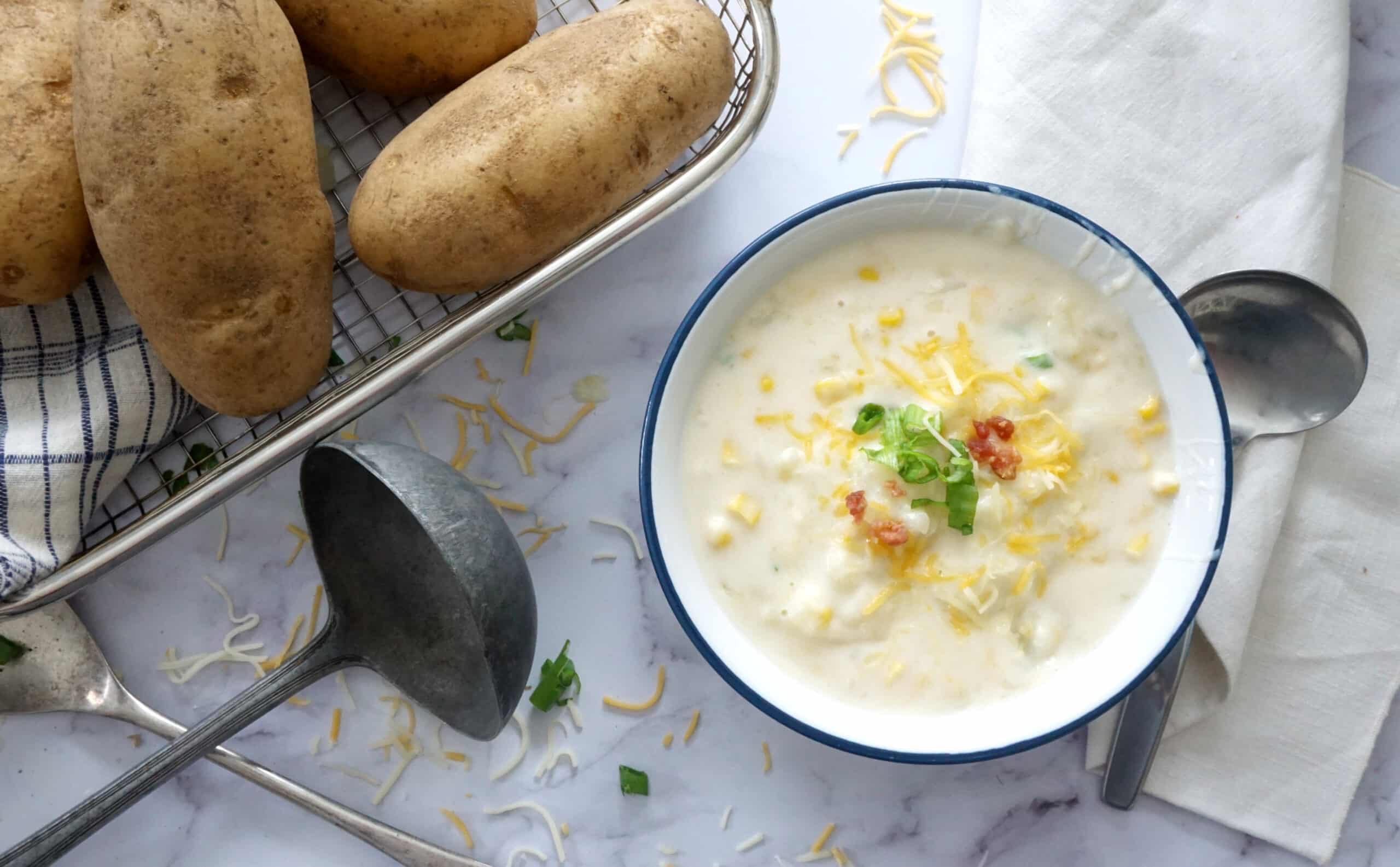 baked potatoes sitting next to southern potato soup