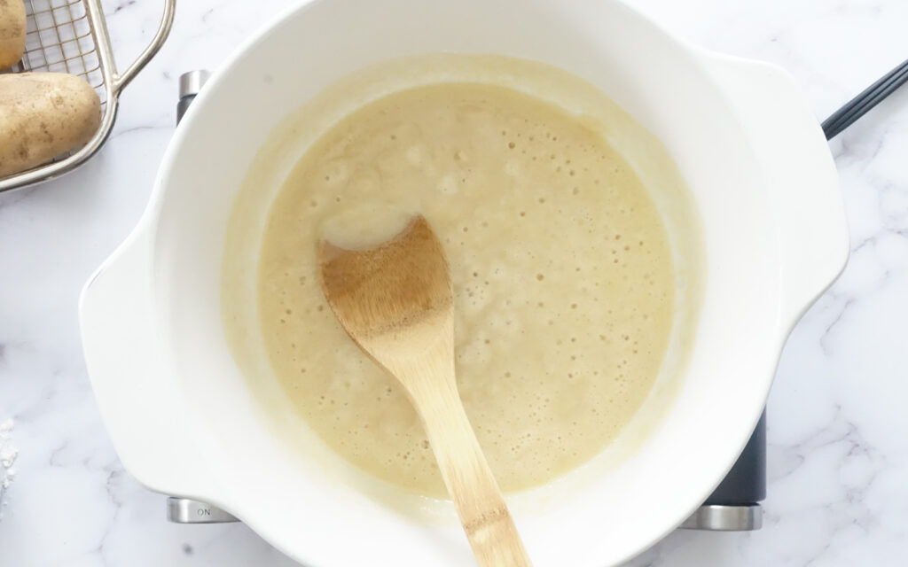 mixing flour and butter for baked potato soup