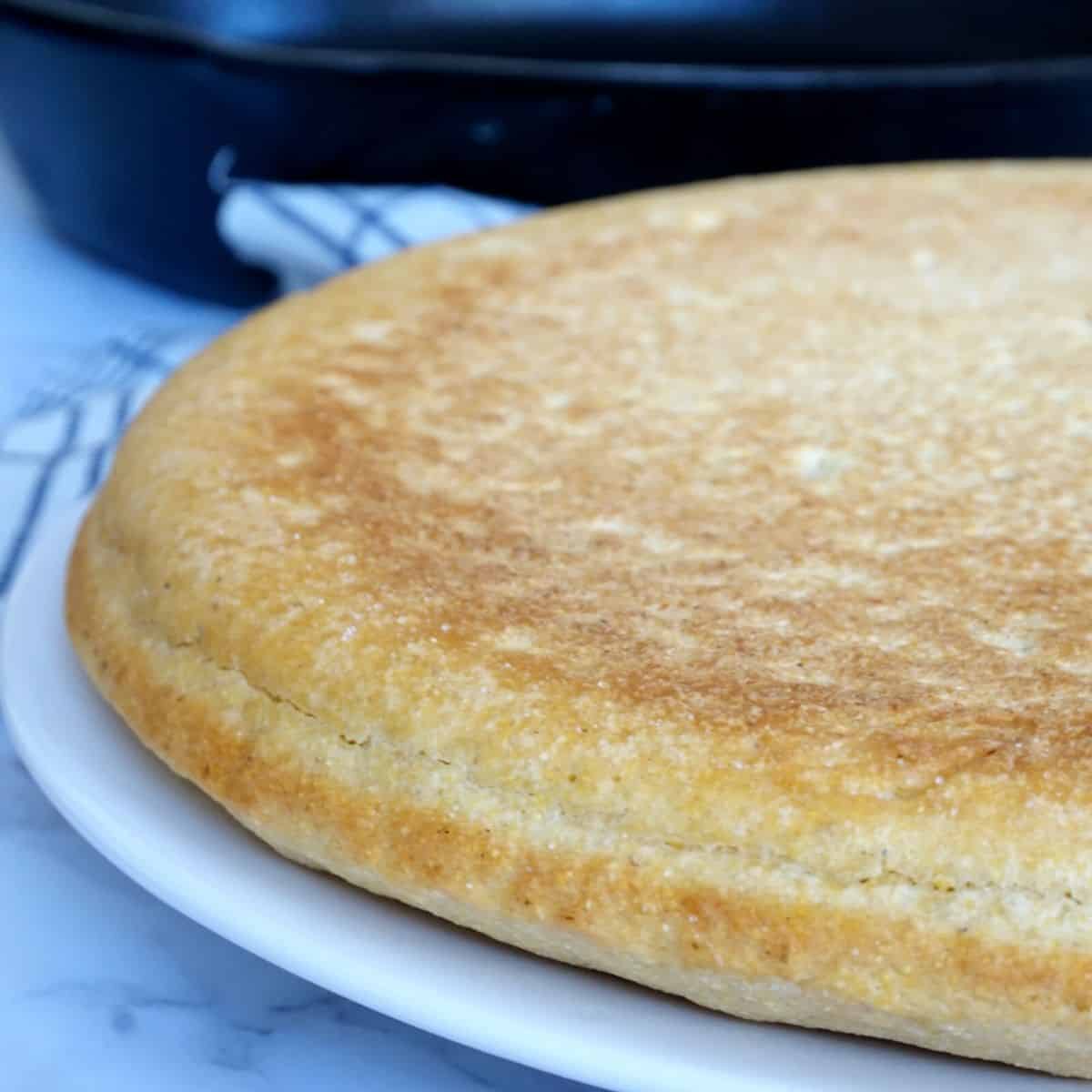 pone of classic southern cornbread on a plate
