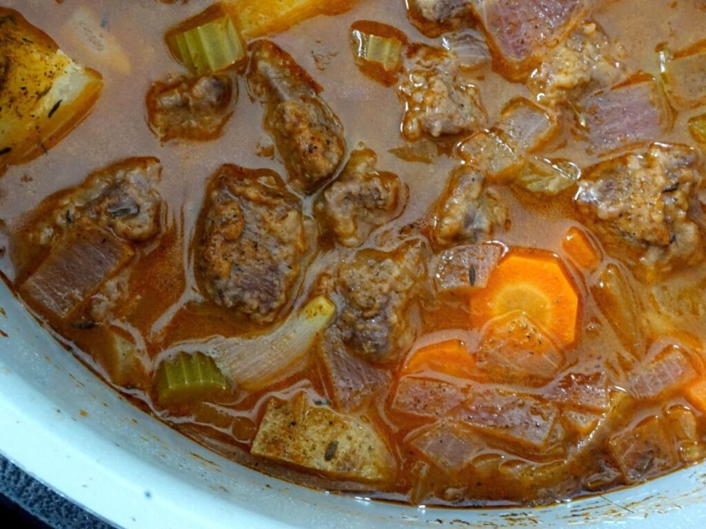 pressure cooker instant pot with venison stew inside