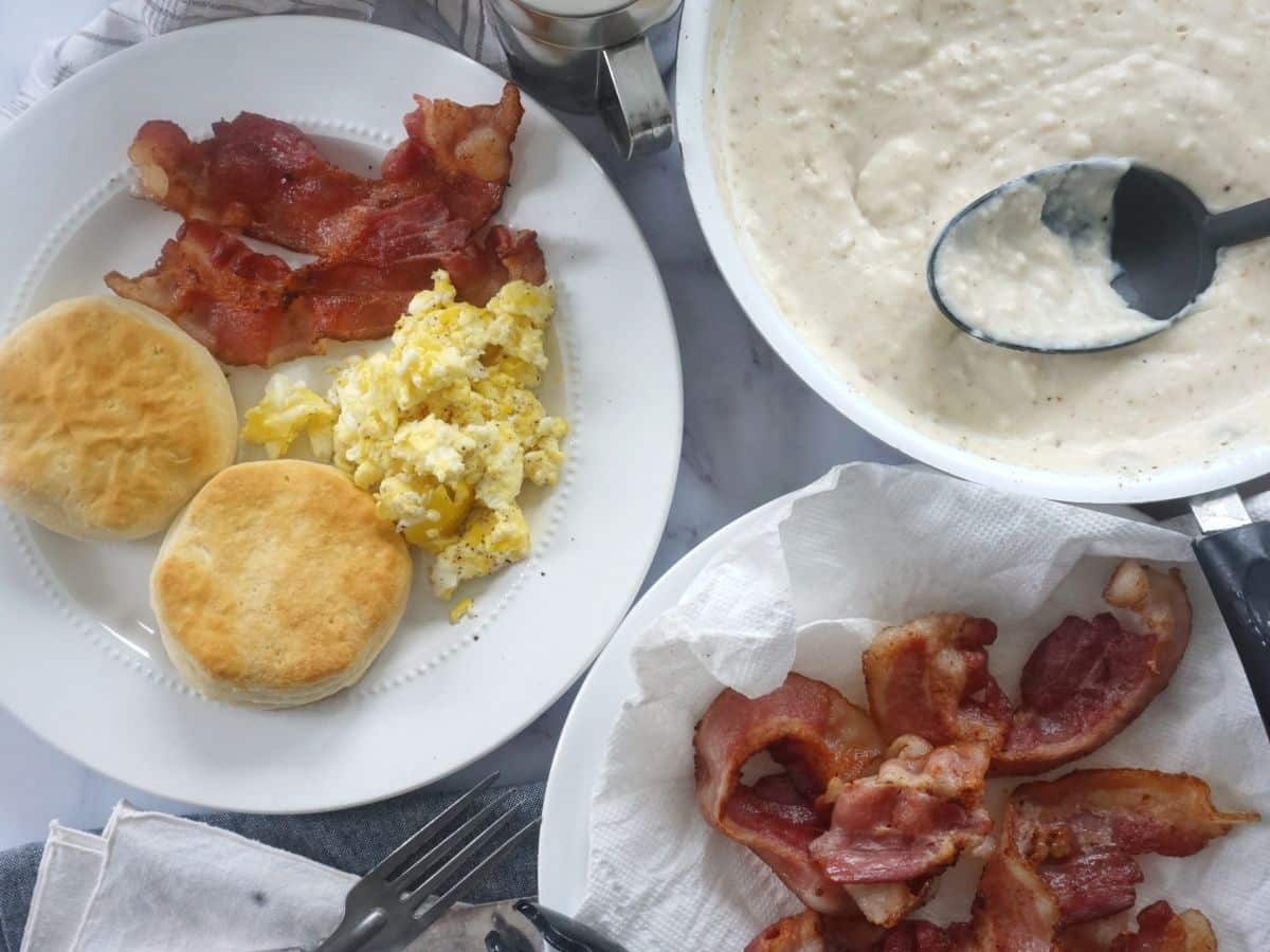 country breakfast with bacon eggs biscuits and gravy