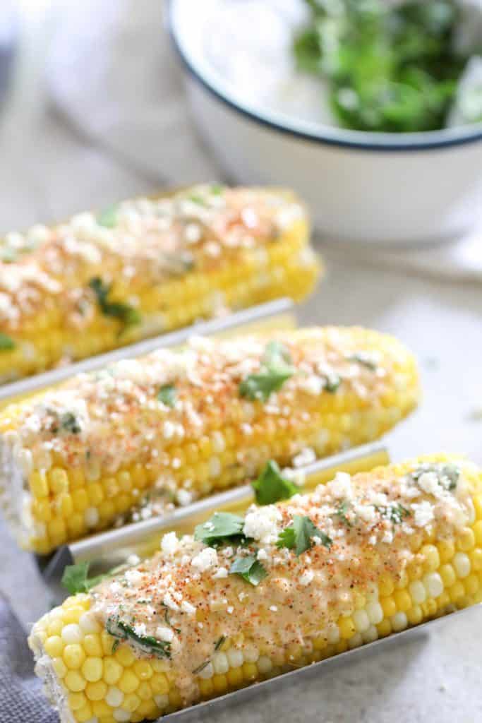 elote with crumbly cheese and cilantro