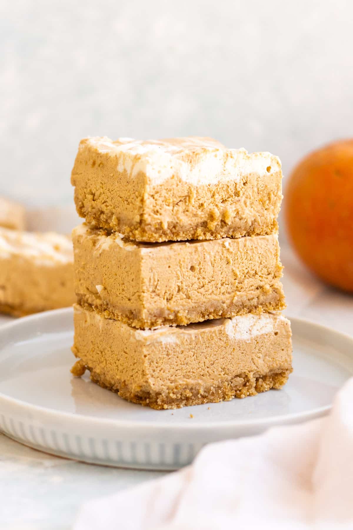 stacked pumpkin pie cheesecake bars