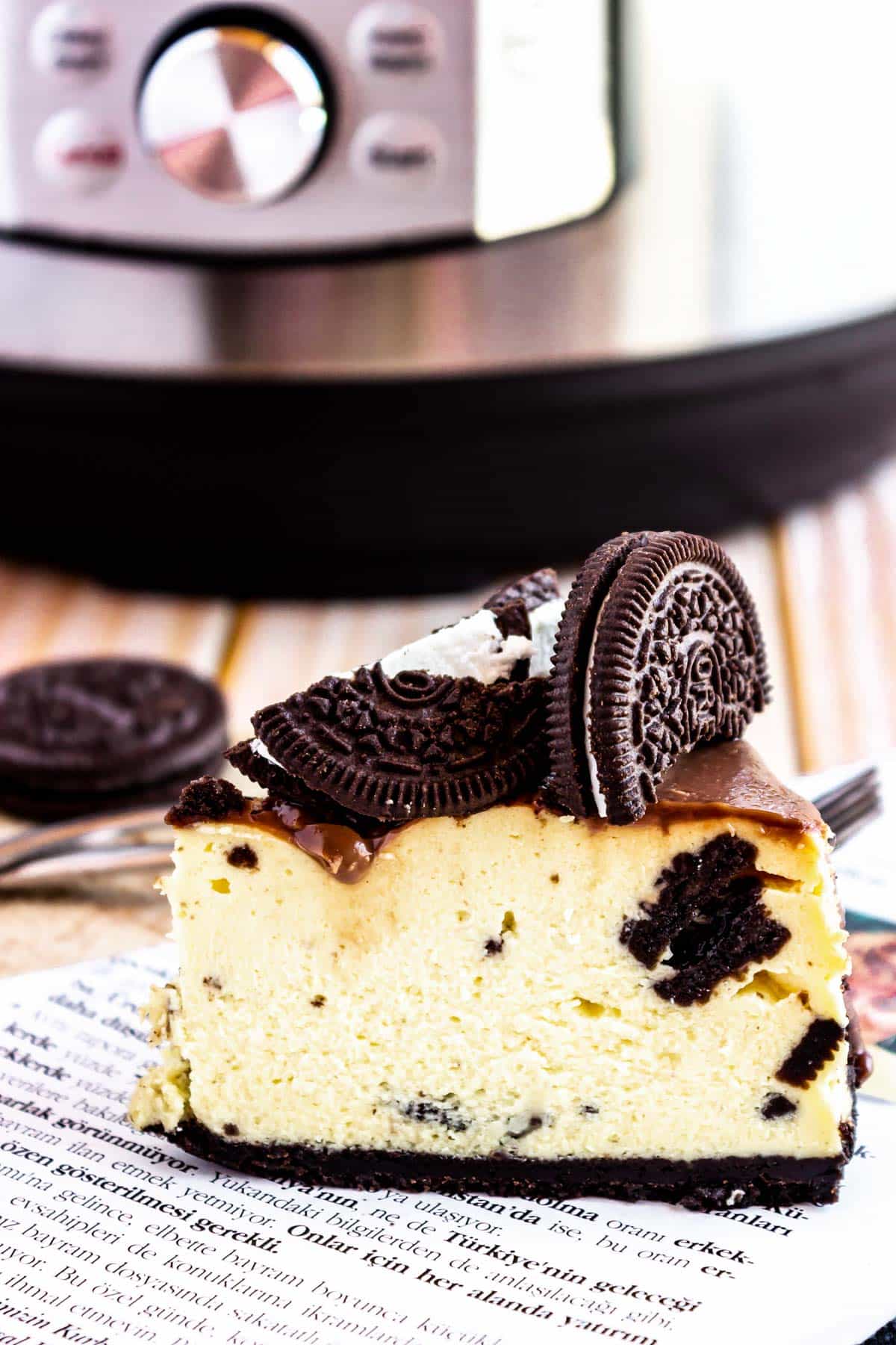 side view of large Oreo cheesecake slice
