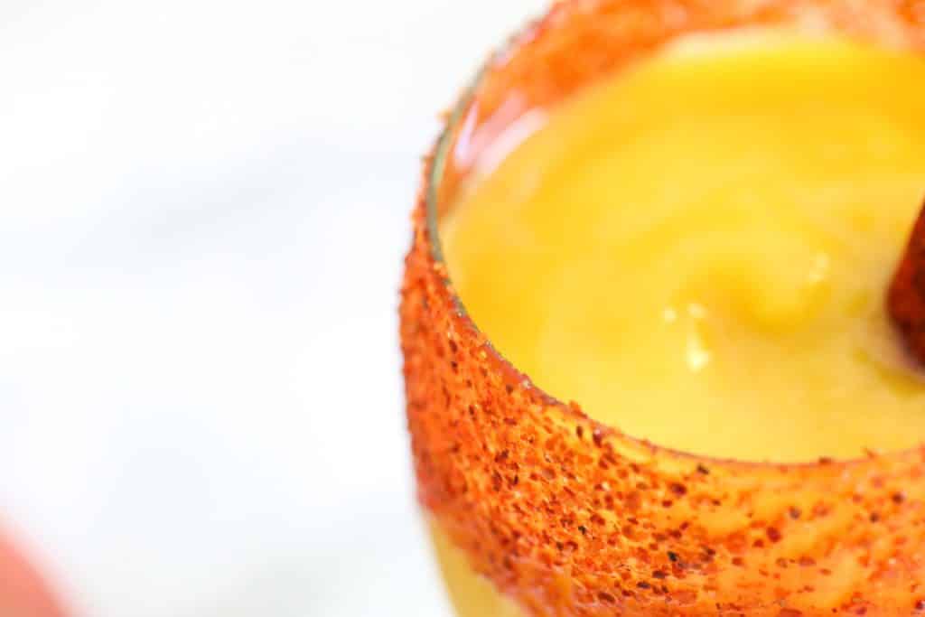 close up of smoothie with mango