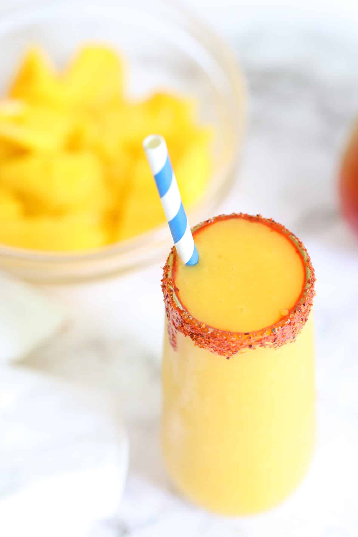 mangonada with sliced fruit mango