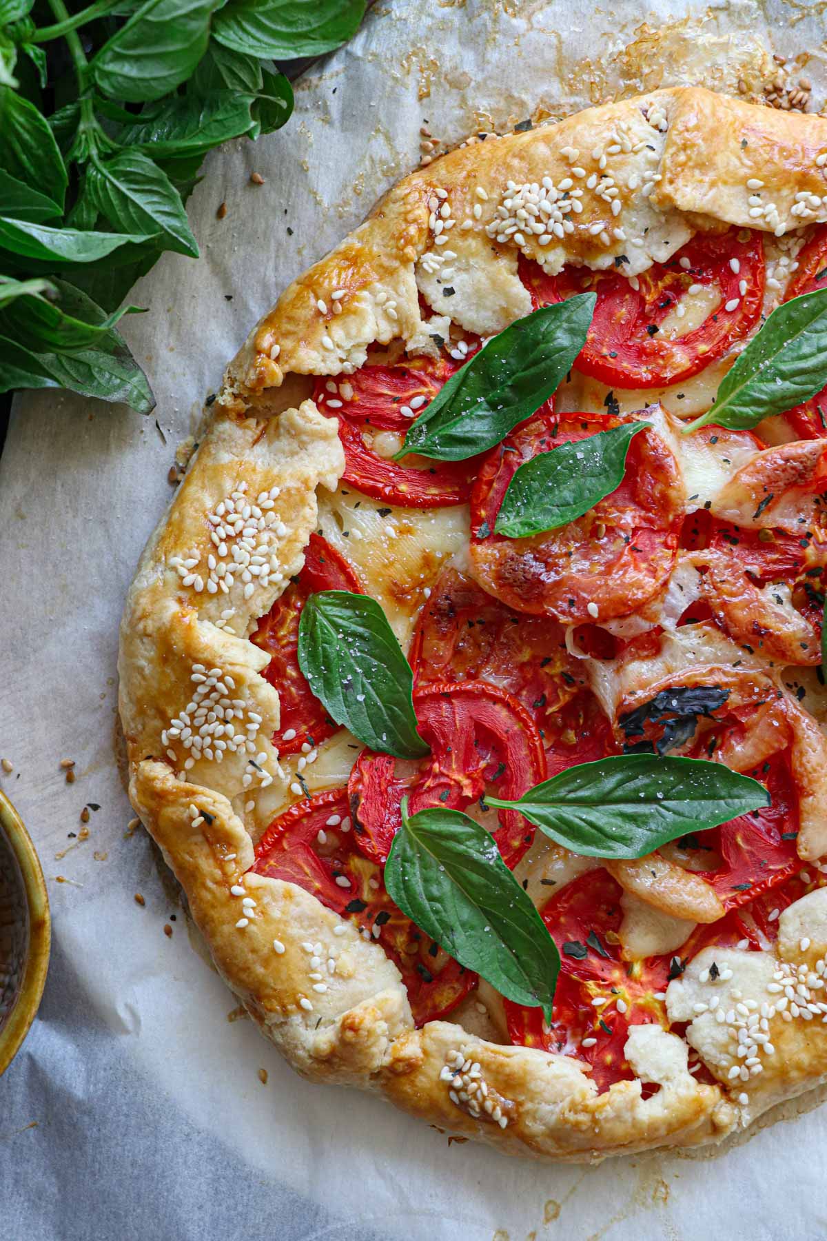 overhead view of a tomato basil mozzarella cheese galette