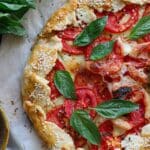 overhead view of a tomato basil mozzarella cheese galette