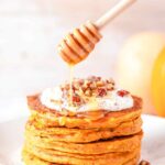pumpkin pancakes with syrup on top