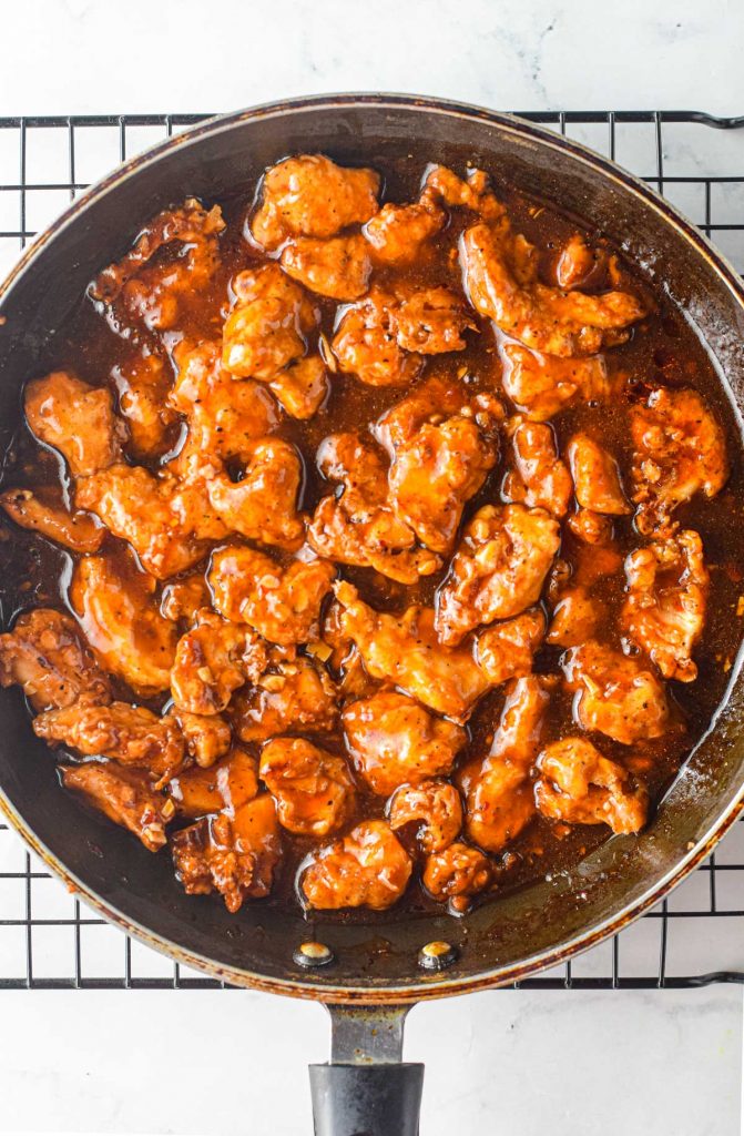 coating chicken in sesame sauce