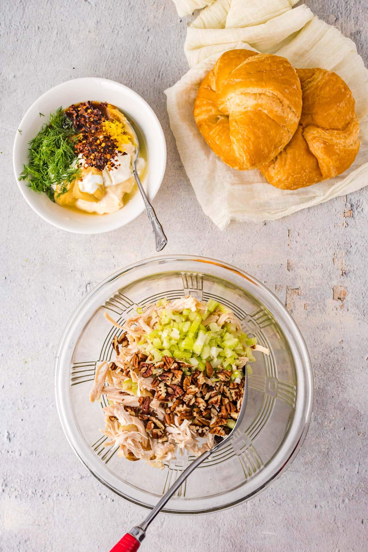 instructions for making chicken salad by combining ingredients in a bowl