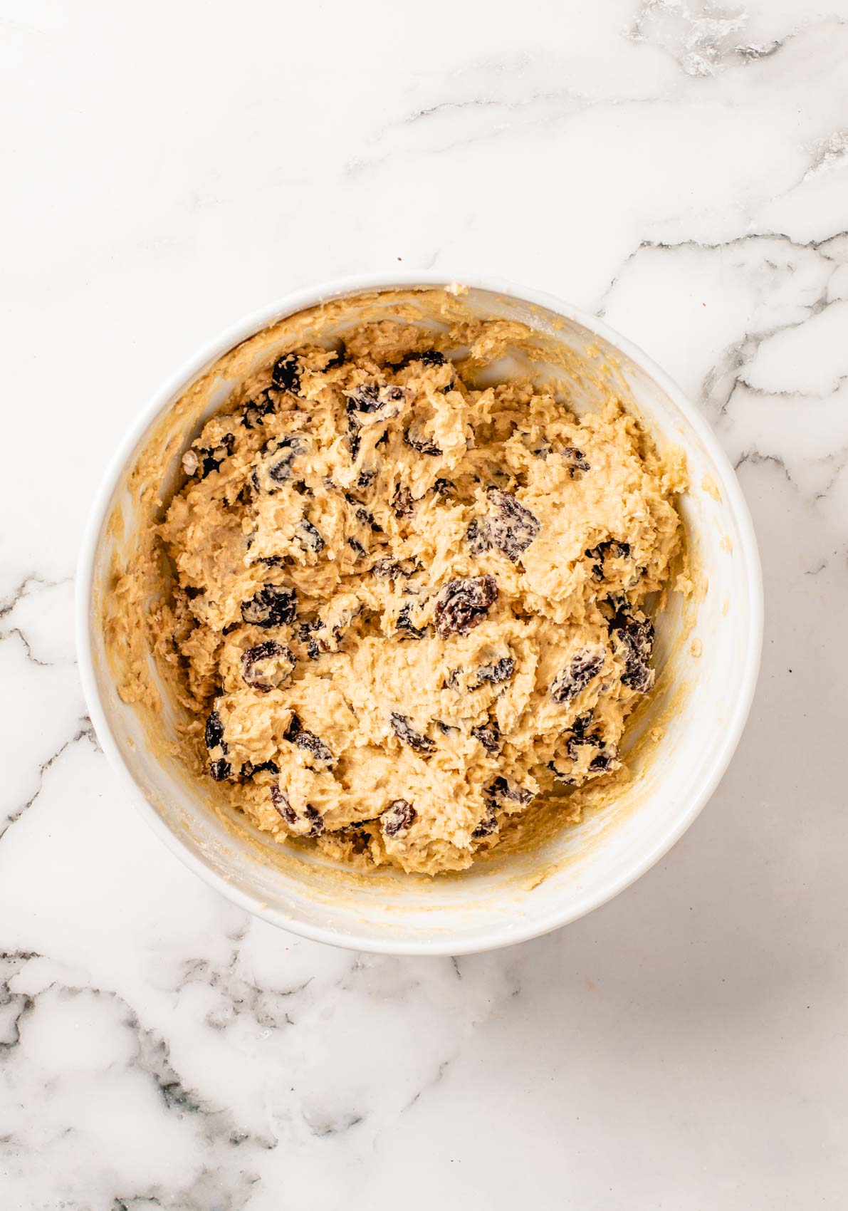 bowl with cookie dough and raisins
