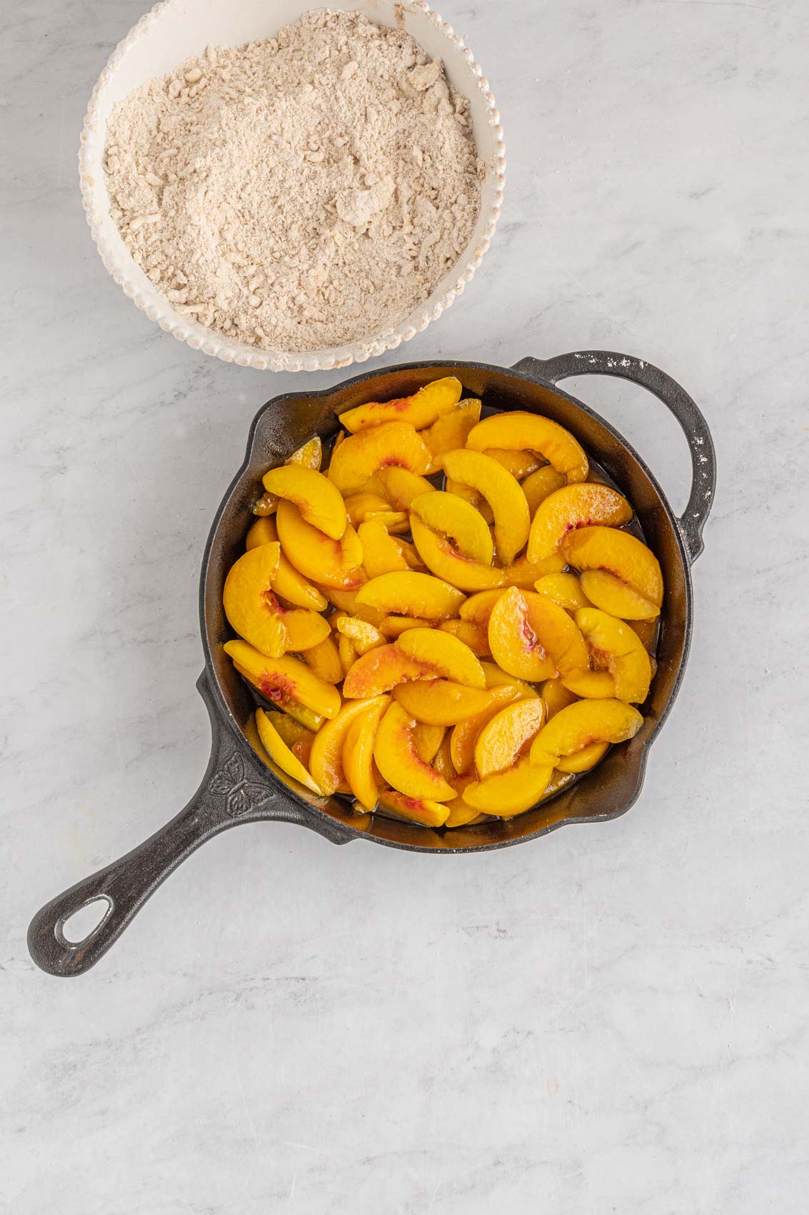 add peaches to skillet or baking dish