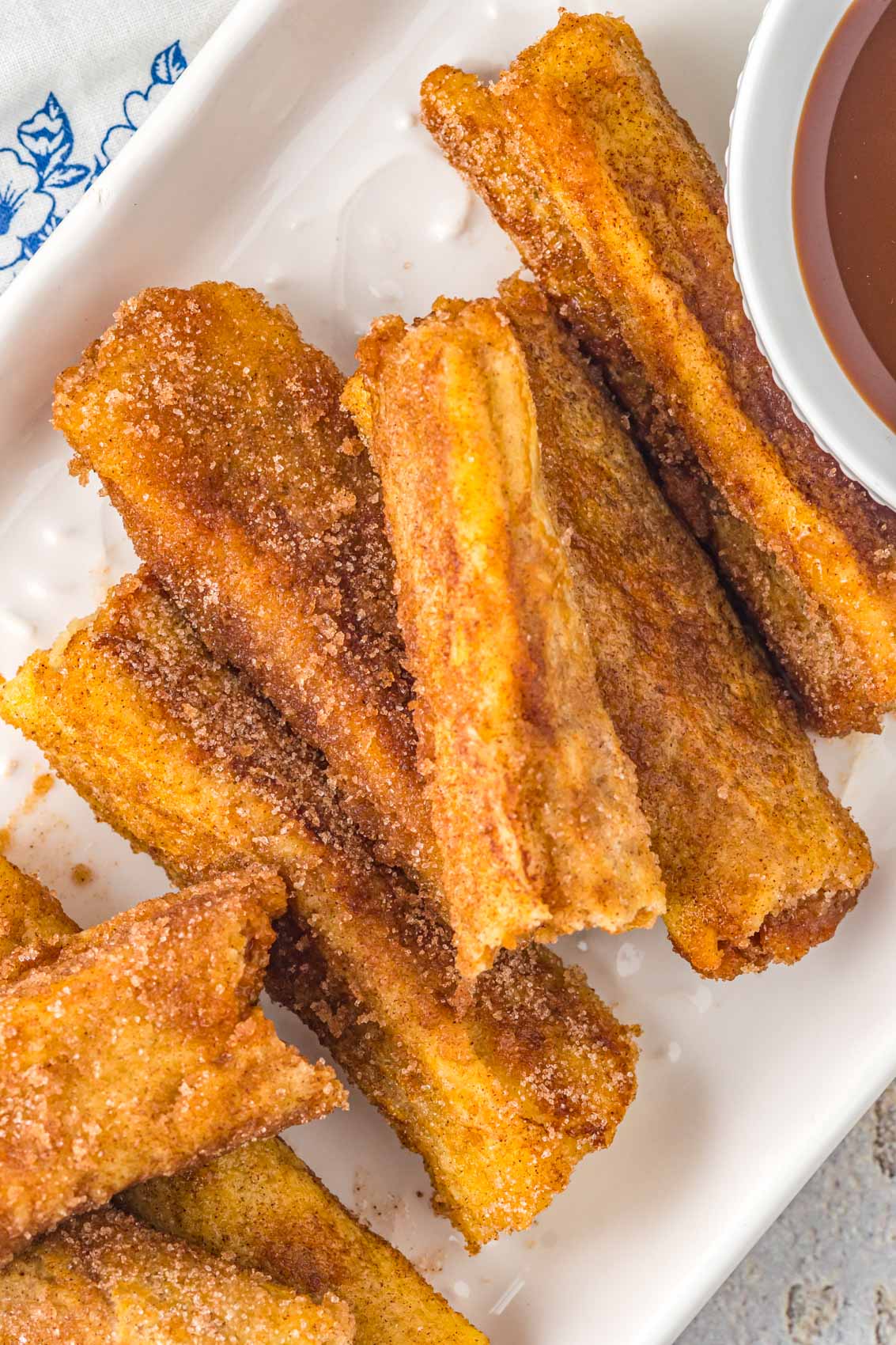 stack of churros french toast sticks