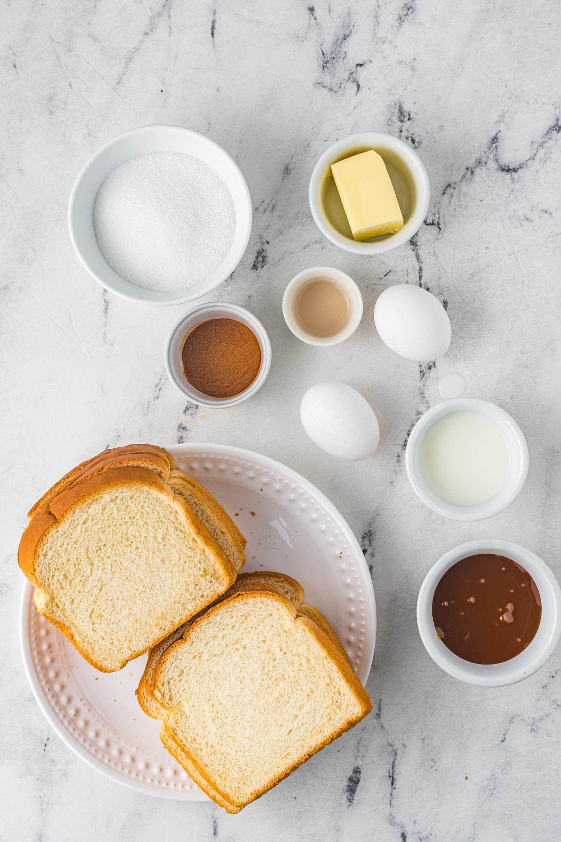 french toast churros ingredients, including white bread, eggs, dulce de leche, butter, cinnamon and sugar