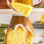lemon pound cake slice with fork and frosting