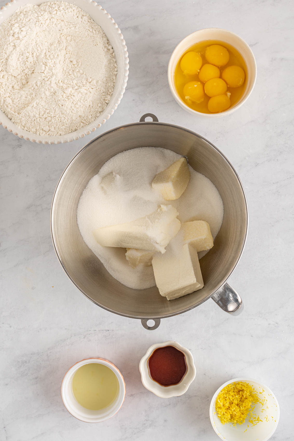 cream cheese and butter in a mixer bowl