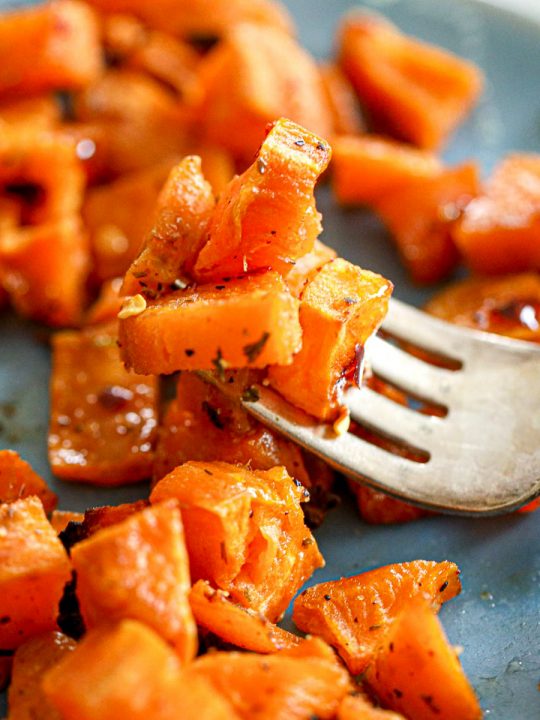 honey red pepper sweet potatoes on a fork
