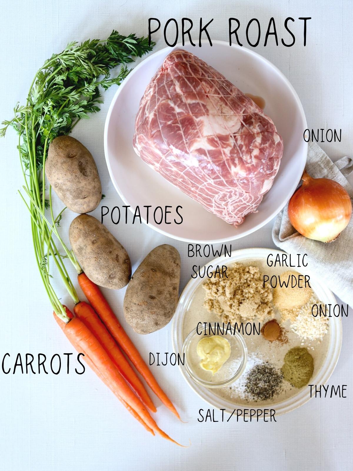 ingredients for instant pot pork roast, including carrots, onion, thyme, dijon, cinnamon, potatoes, garlic powder