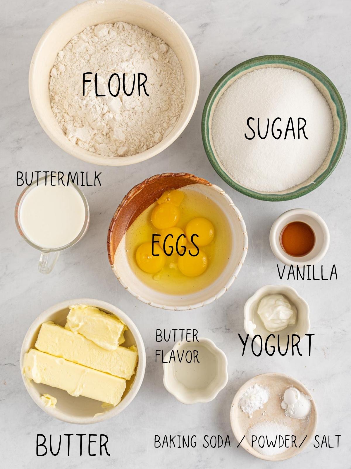 ingredients for Kentucky butter cake including sugar, eggs, vanilla, flour, yogurt, buttermilk, baking soda