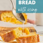 golden buttery peach bread with glaze pouring over a slice