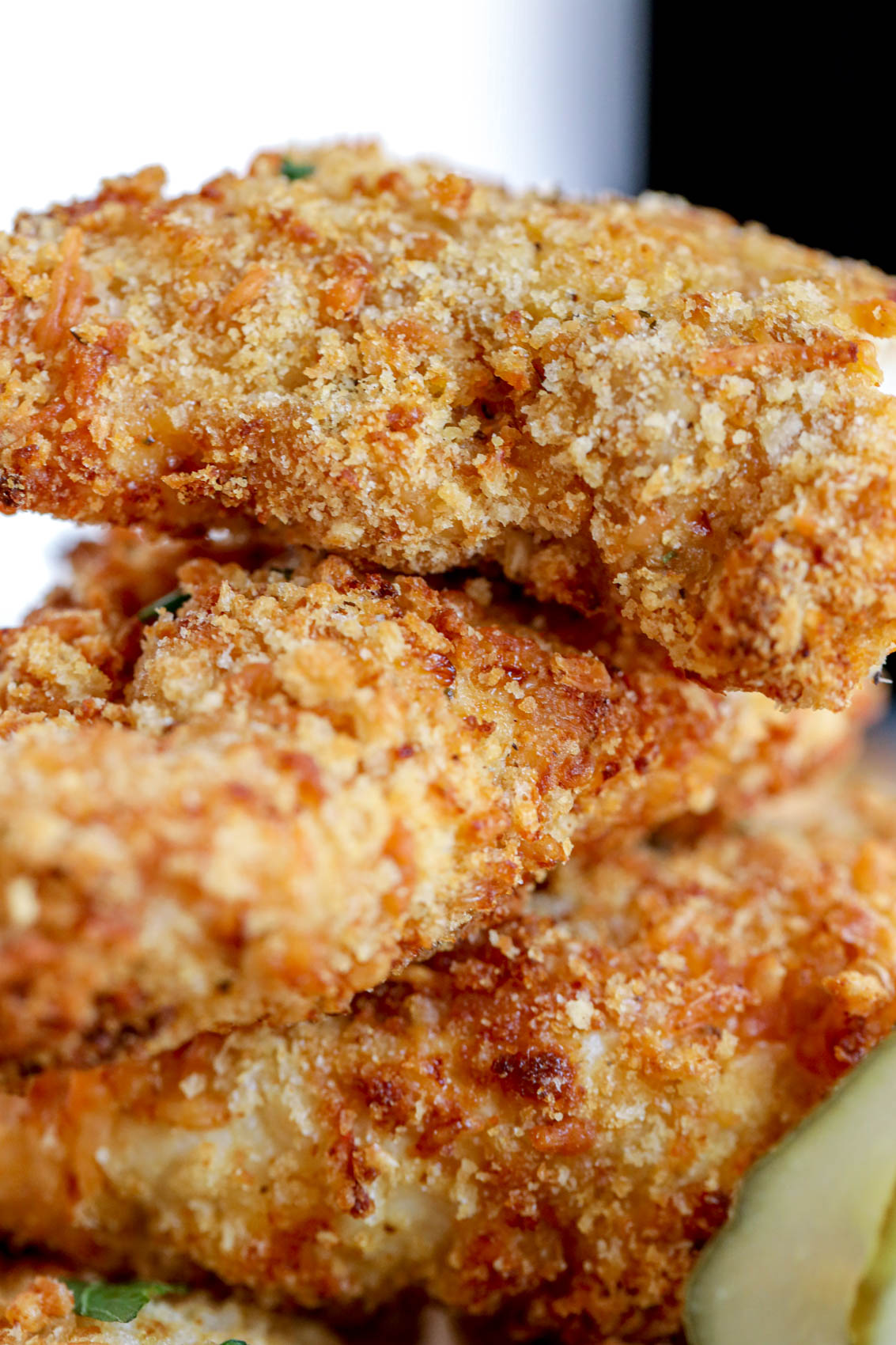 showing crisp detail of golden chicken tender breading