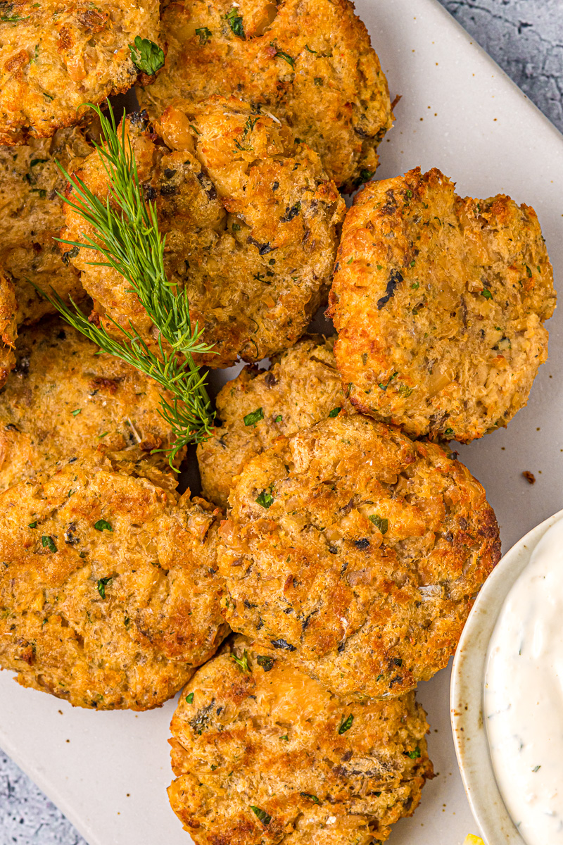 stack of salmon patties with dill