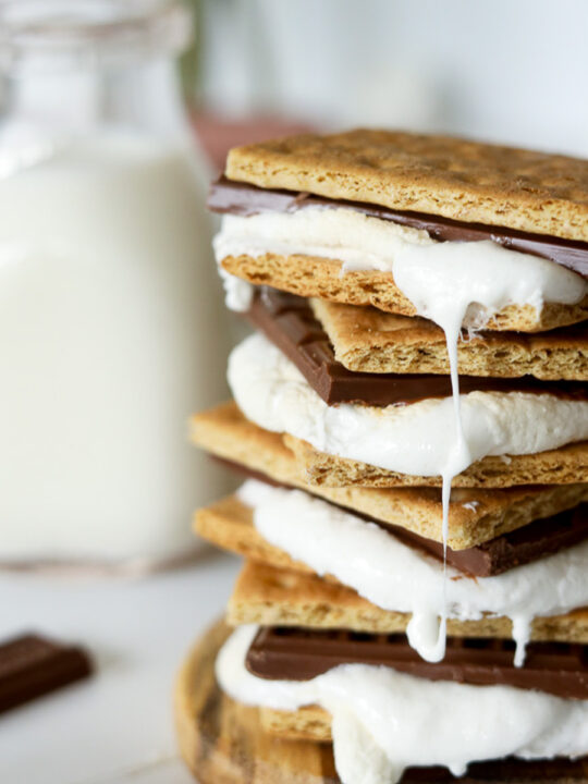 stack of s'mores with marshmallow dripping