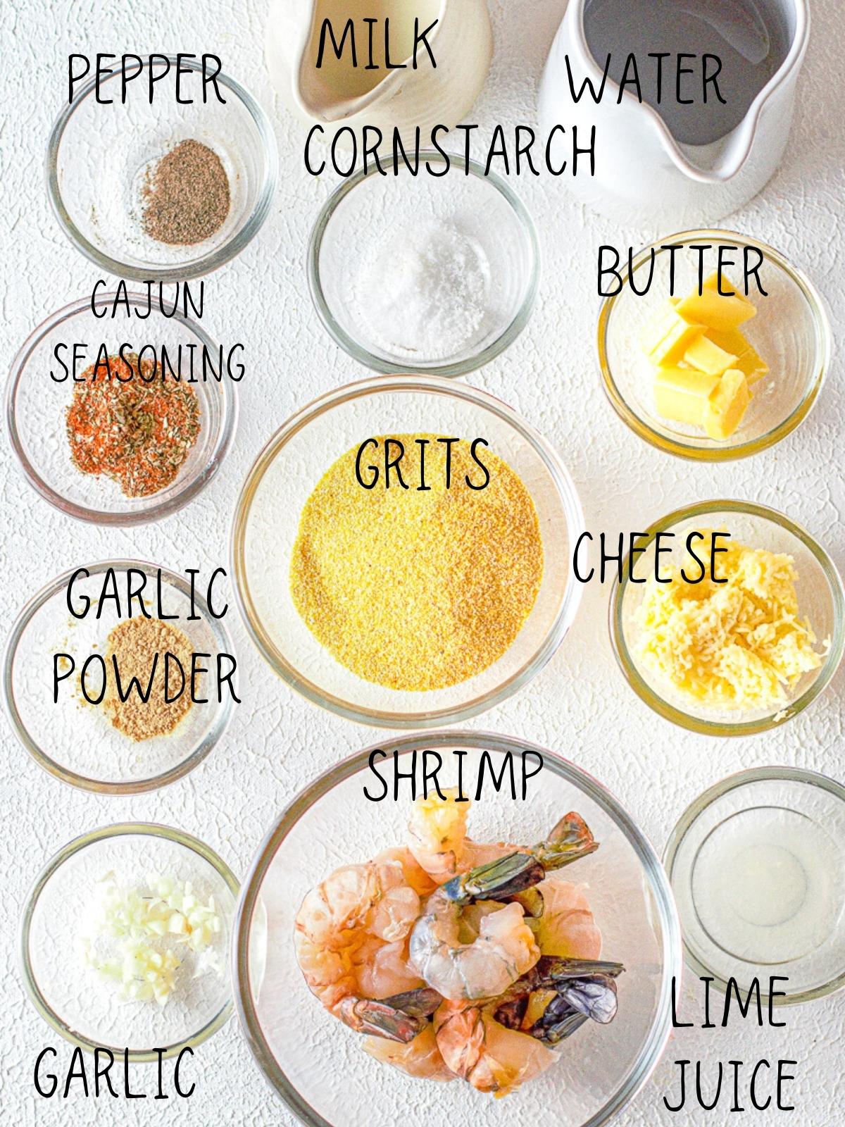 ingredients for shrimp and grits, including milk, garlic, cajun seasoning  blend