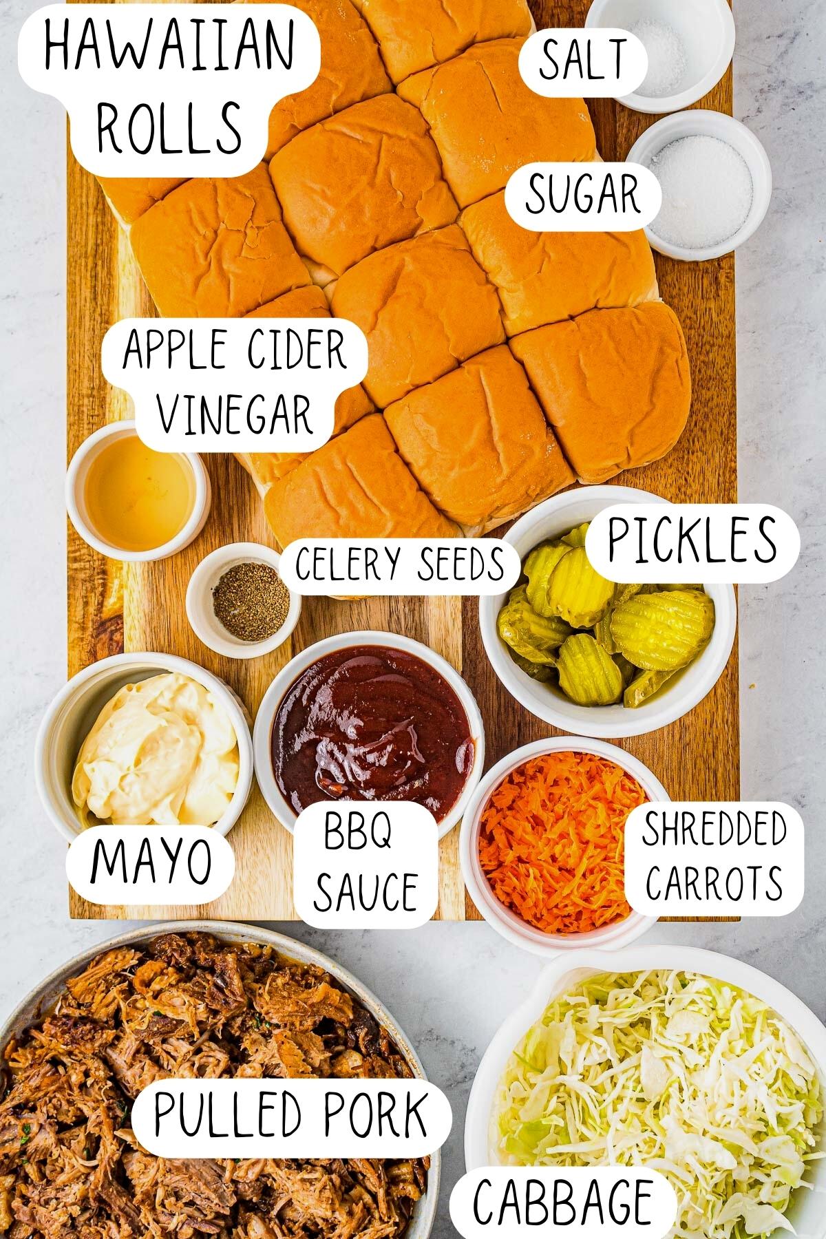 ingredients for pork sliders, including Hawaiian rolls, coleslaw ingredients, pickles, mayonnaise and BBQ sauce