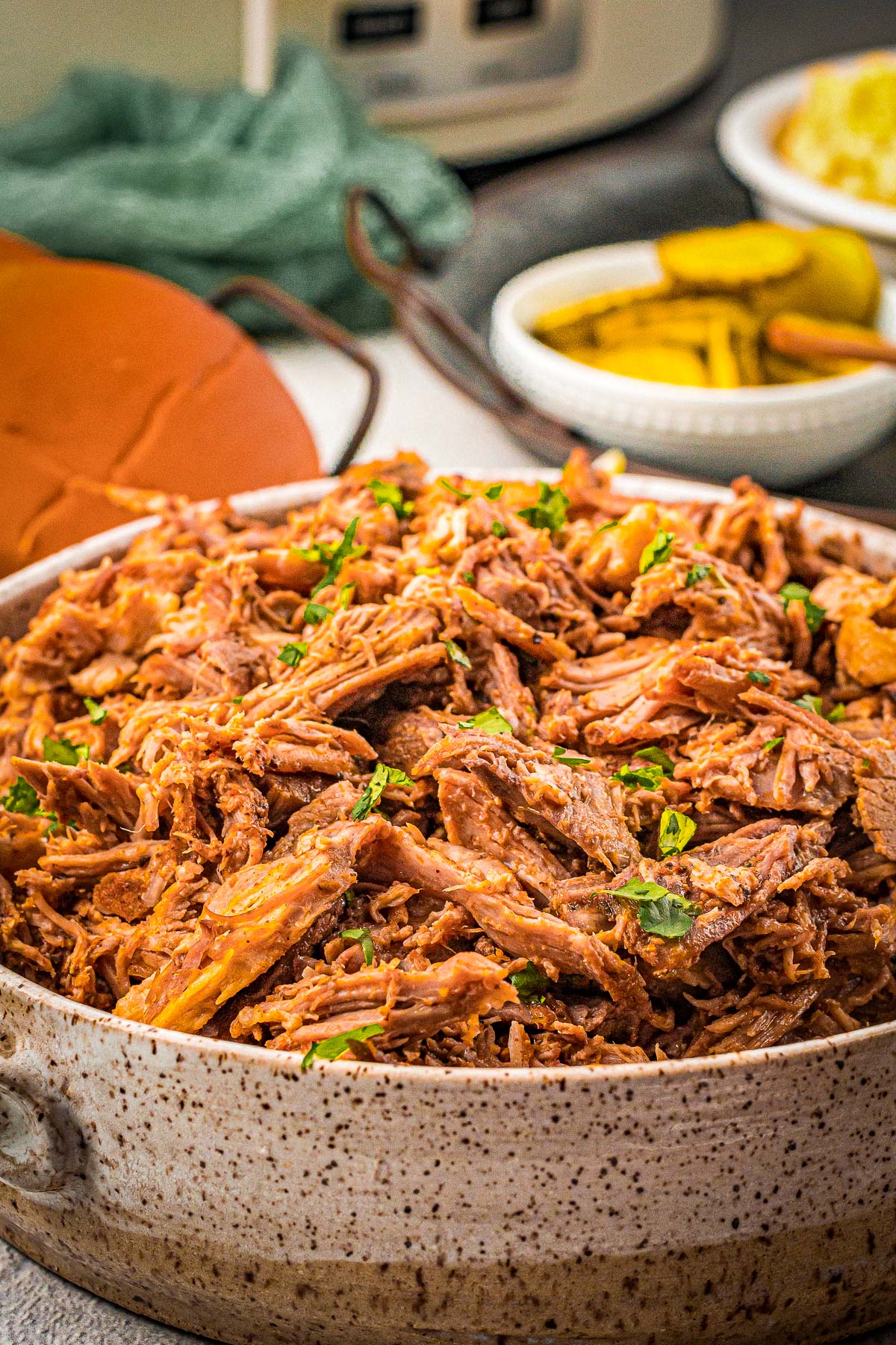 juicy pulled pork in a large bowl