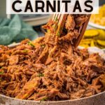 slow cooker carnitas with tongs