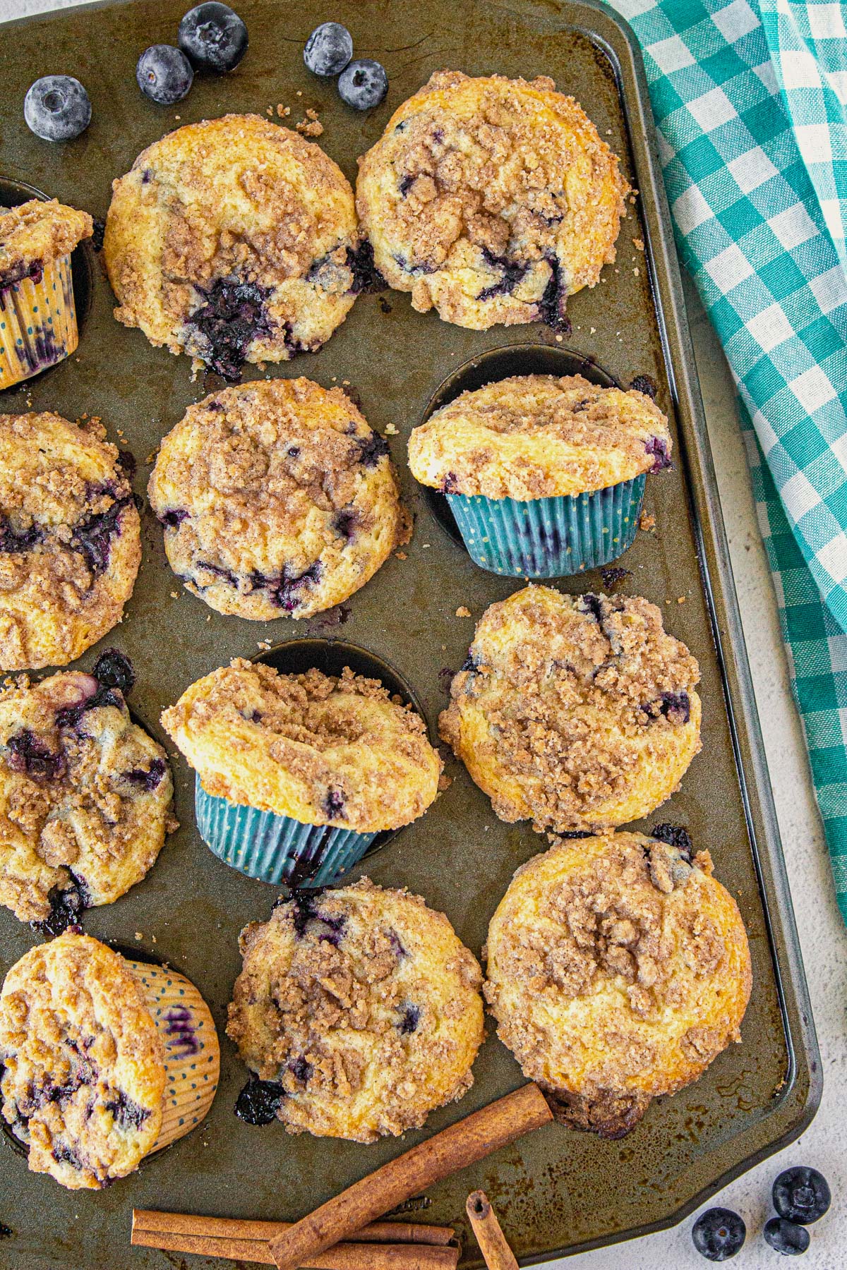 old fashioned blueberry streusel muffins in a pan