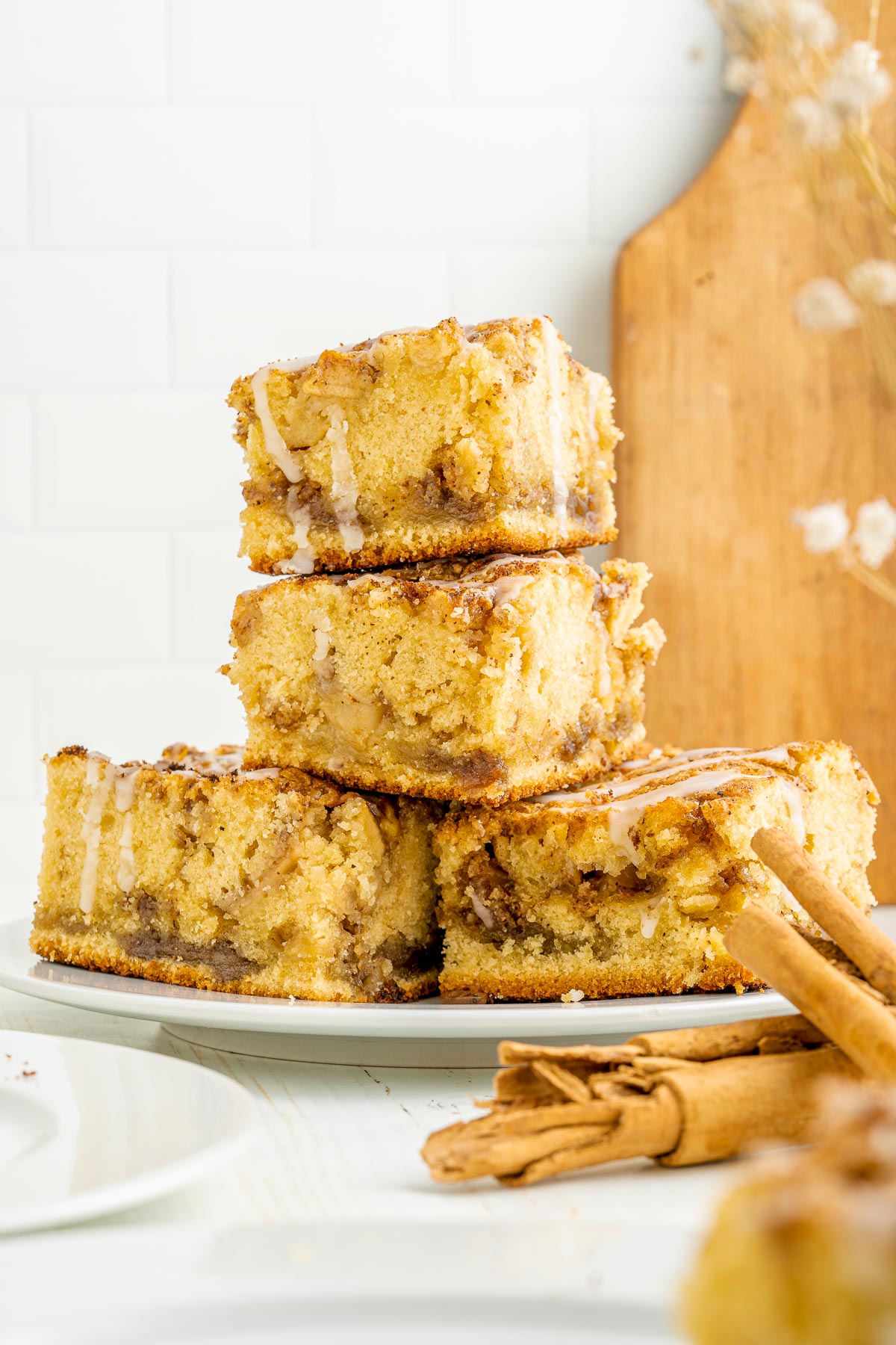 stack of apple cinnamon cake slices with icing
