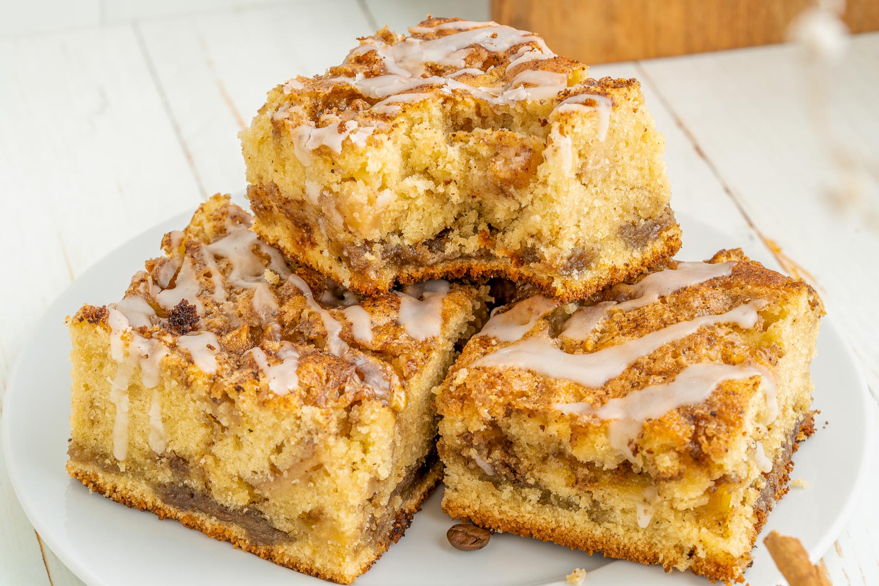 three slices of apple cake with glaze