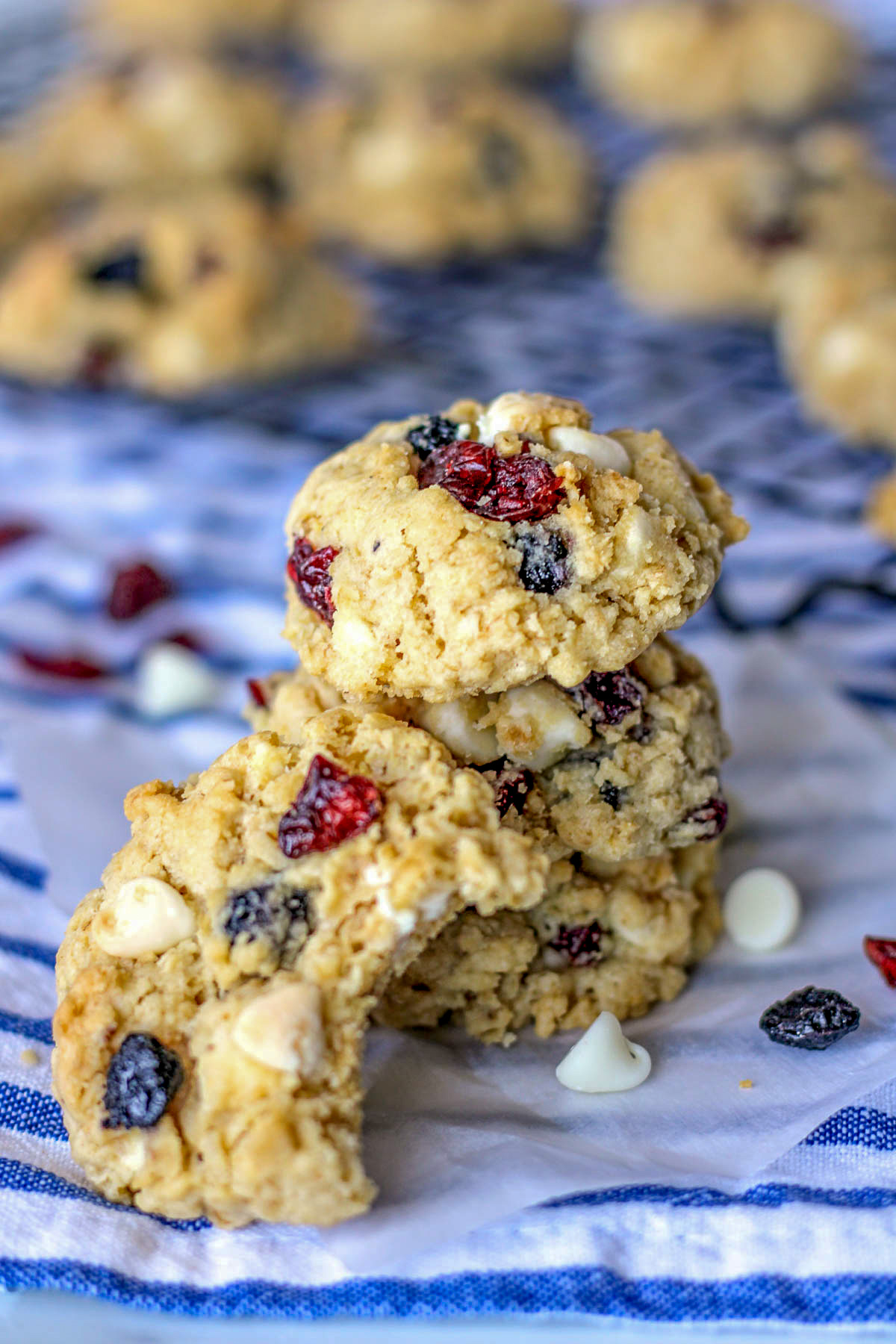 stack of oatmeal cookies with blueberries and white chocolate chips