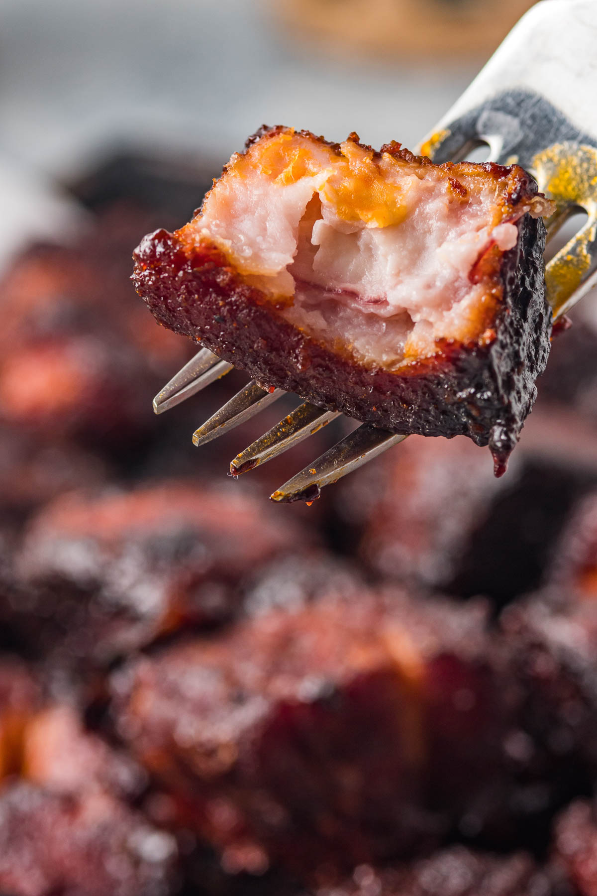 piece of bbq burnt ends on a fork