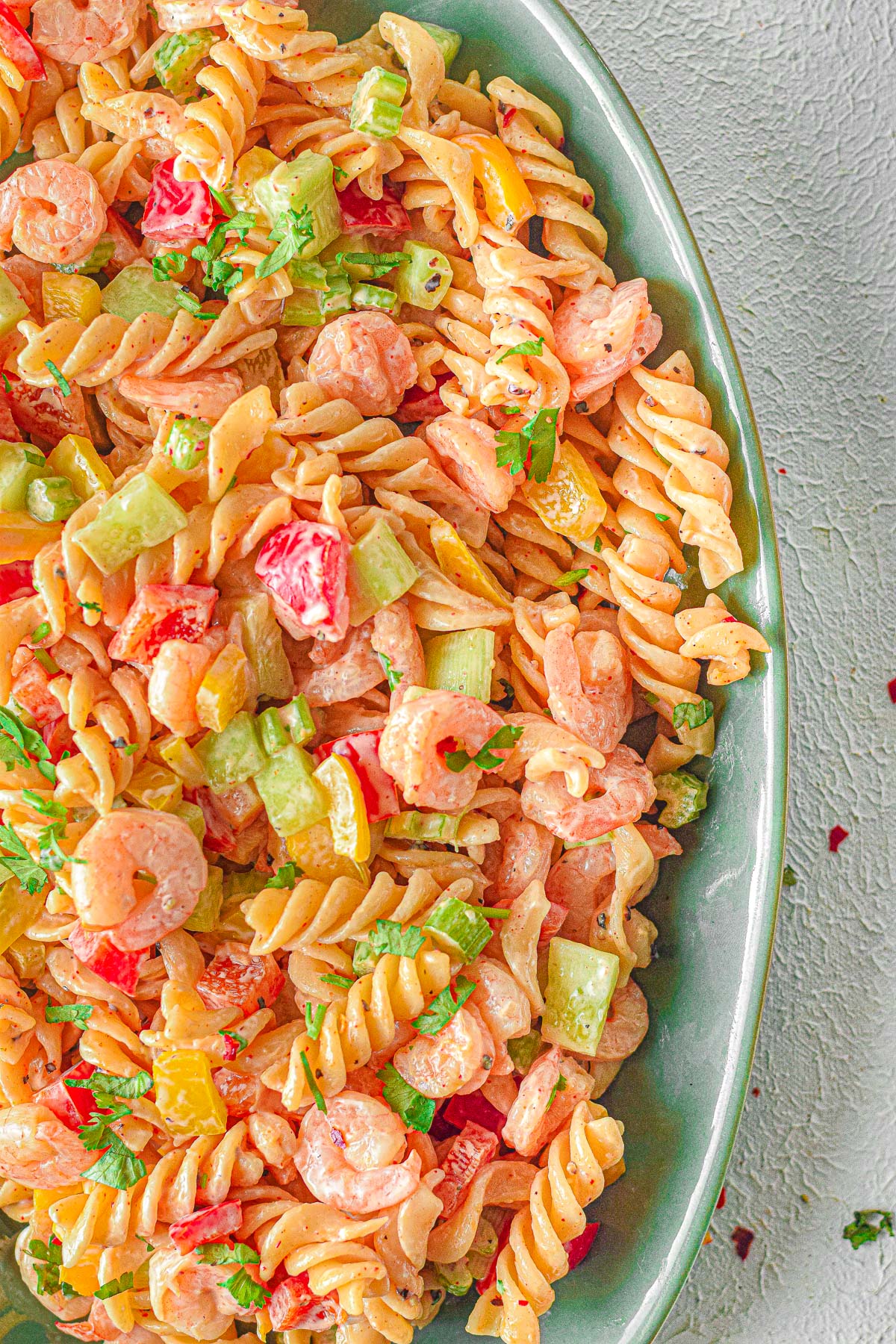 creamy shrimp pasta salad in a large serving bowl